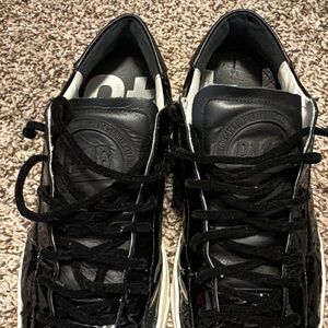 P448 John’s black shiny sneakers size 42